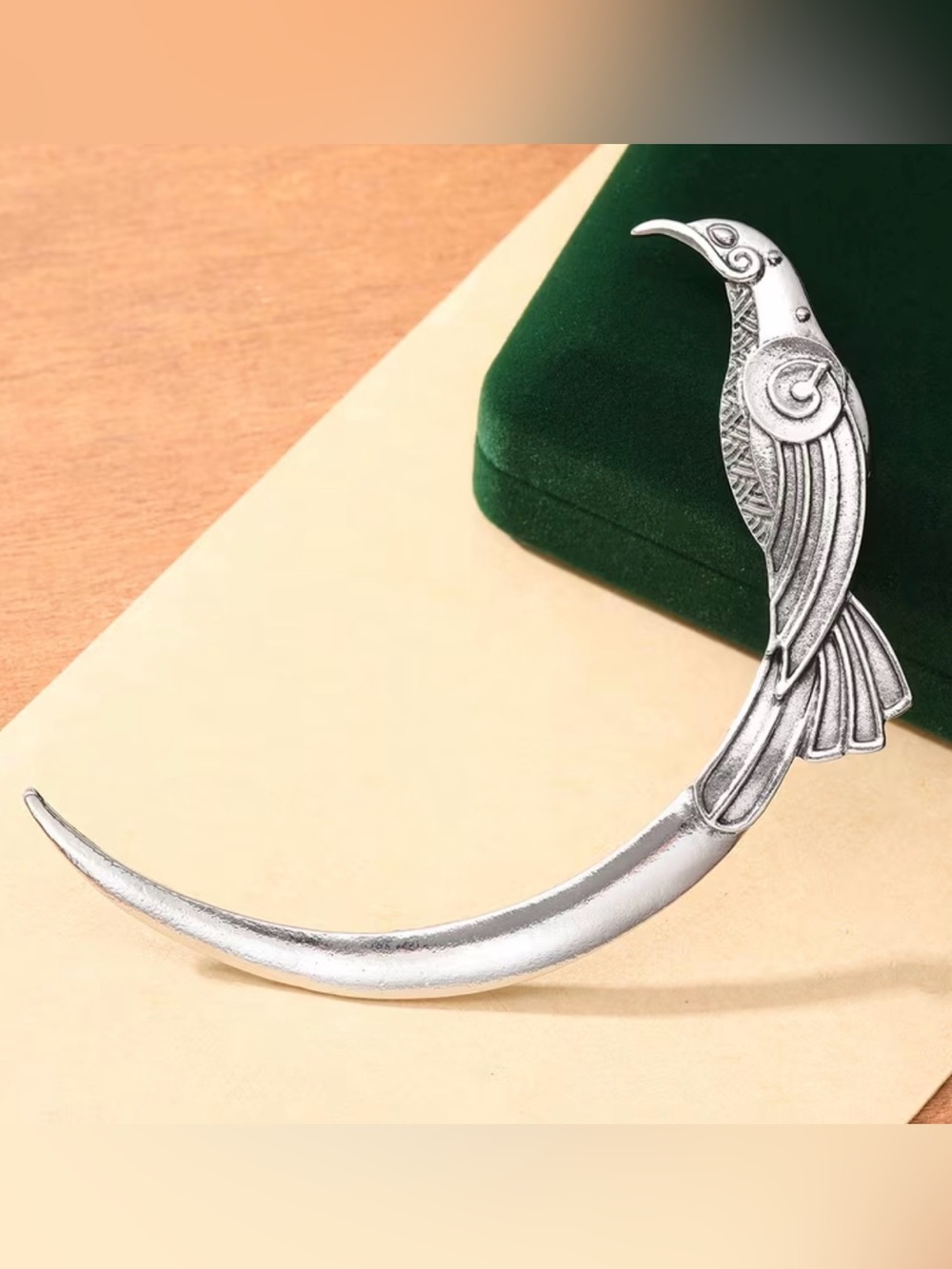 Silver Bird Hair Accessory with Ornate Wing Detail
